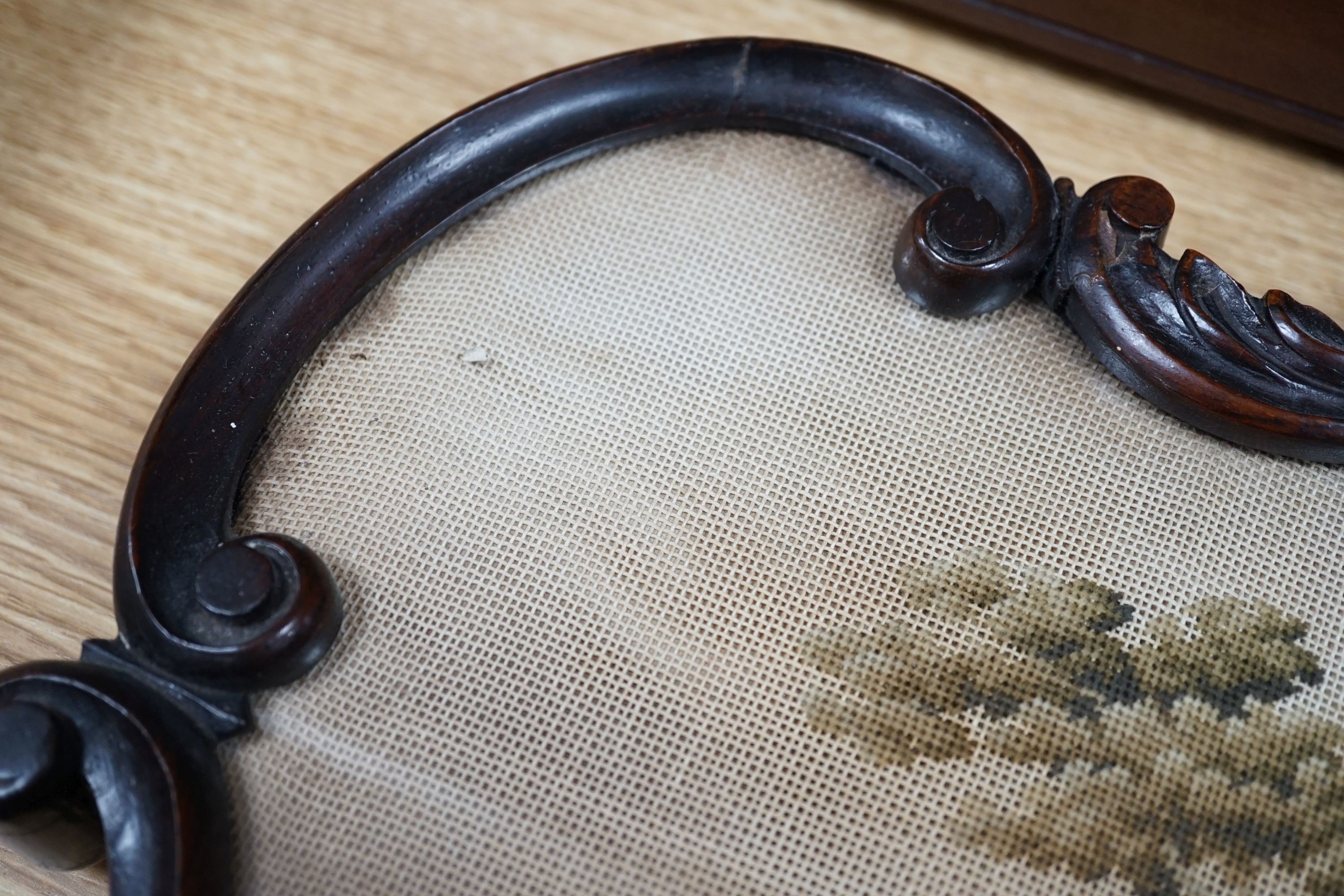 A 19th century petite point framed screen (without pole) of a man and a dog